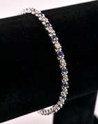 Delightful Diamond and Sapphire Tennis Bracelet in 14K White Gold