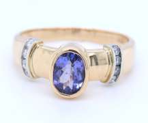 Powerful Yellow Gold Tanzanite Bezel Set and Diamond Side Ring