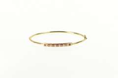 14K Yellow Gold 0.75 Ctw Ruby Diamond Inset Oval Bangle Bracelet