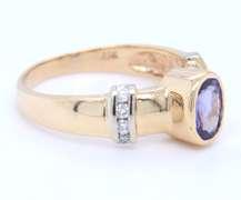 Powerful Yellow Gold Tanzanite Bezel Set and Diamond Side Ring