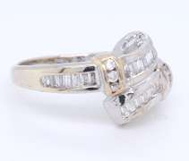 Sparkling White Gold Channel Set Baguette and Round Diamond Bypass Ring