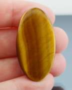 Mezmerizing 43.83ct Tigers Eye cabochon