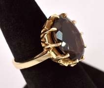 Brilliant Oval Cut Smokey Quartz Ring in Yellow Gold