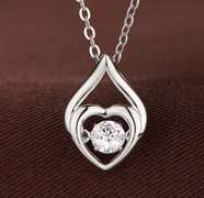Beautiful Heart with angel's Protection Dancing stone Pendant