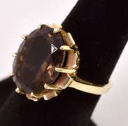 Brilliant Oval Cut Smokey Quartz Ring in Yellow Gold