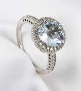 Modern Aquamaring Ring with a Halo of Diamonds