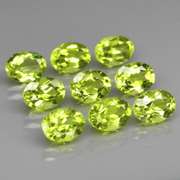 Dazzling 7.85ct untreated apple green Peridot set