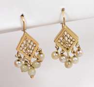 Tasteful Dangling Pearl Earrings in 14K Yellow Gold