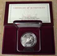 1996 Proof Smithsonian Institution 150th Anniversary Commemorative Silver Dollar.