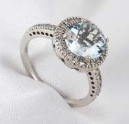 Modern Aquamaring Ring with a Halo of Diamonds