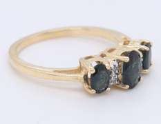 Gorgeous Yellow Gold oval Sapphire and Diamond Three Stone Ring