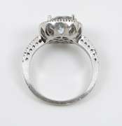 Modern Aquamaring Ring with a Halo of Diamonds