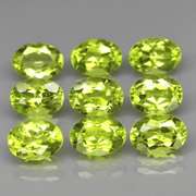 Dazzling 7.85ct untreated apple green Peridot set