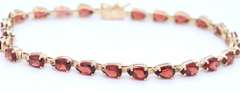 Attractive Yellow Gold Garnet oval Bracelet