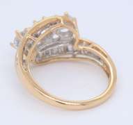 Elegant Yellow Gold Round Brilliant Cut and Baguette Diamond Ring