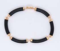 Pleasing Yellow Gold Black Onyx Segment Link Bracelet