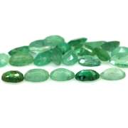 Bright emerald green 7.61ct 23pc emerald set