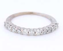 Dazzling White Gold Shared Prong Diamond Band