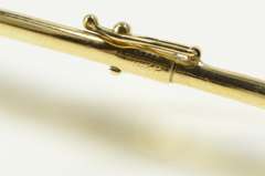 14K Yellow Gold 0.75 Ctw Ruby Diamond Inset Oval Bangle Bracelet