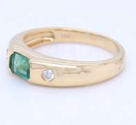 Attractive Yellow Gold Emerald and Diamond Bezel Set Ring