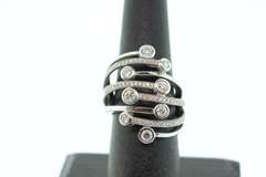 LADIES 18K WHITE GOLD AND DIAMOND RING