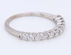 Dazzling White Gold Shared Prong Diamond Band