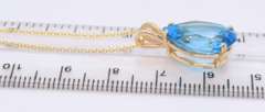 Fabulous Yellow Gold Pear Shaped Blue Topaz pendant on Chain