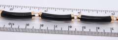 Pleasing Yellow Gold Black Onyx Segment Link Bracelet