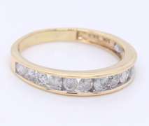 Graceful Yellow Gold Channel Set Diamond Band