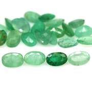 Bright emerald green 7.61ct 23pc emerald set