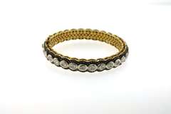 Suggestively Scalloped Diamond Bangle