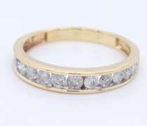 Graceful Yellow Gold Channel Set Diamond Band