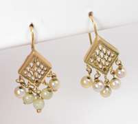 Tasteful Dangling Pearl Earrings in 14K Yellow Gold