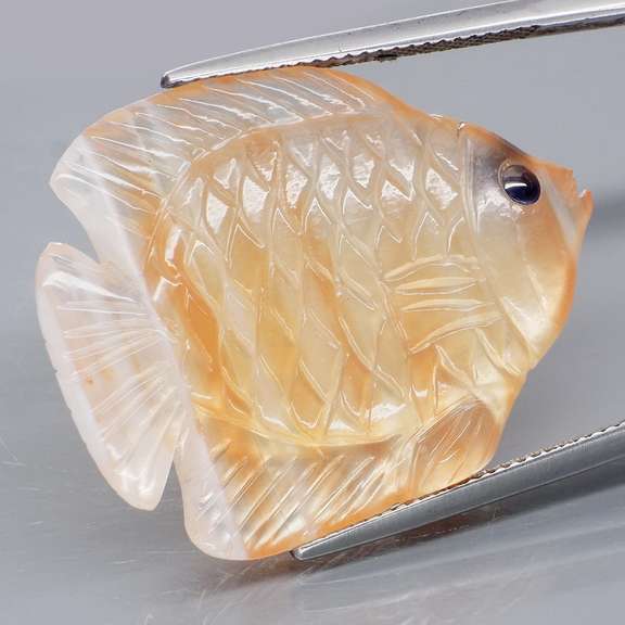 Gorgeous 34.47ct striped Agate and Sapphire carving