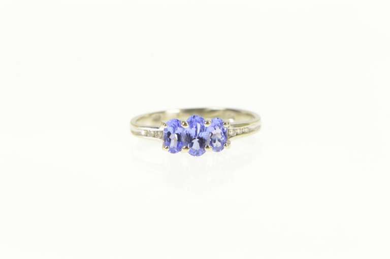 14K White Gold Oval Tanzanite Three Stone Diamond Accent Ring