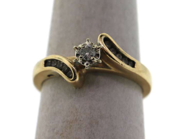 Lone Diamond Ring with encrusted Channel Set Diamonds inside 14k Gold Band