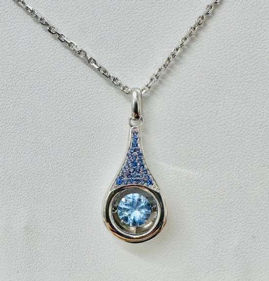 Platinum over 925 non tarnish Sterling silver with large fancy blue pendant