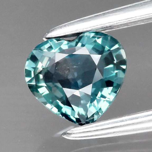 Stunning heart cut .46ct blue green Sapphire