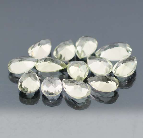 Gem grade 35.28ct pear cut green Quartz set