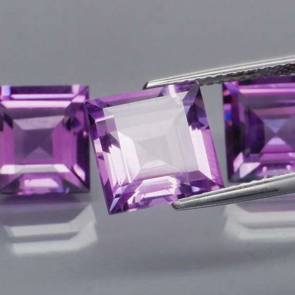 Amazing 10.16ct matched bright purple Amethyst set