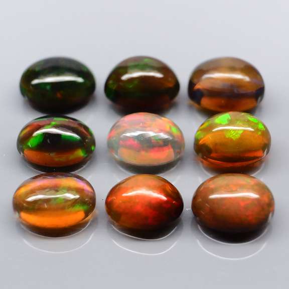 Beautiful 5.24ct 9 piece Ethiopian black opal set