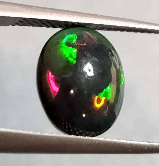 Glistening 3.61ct Welo Black Opal cabochon