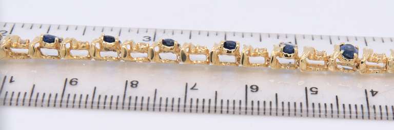 Incredible 18kt Yellow Gold Blue Sapphire and Diamond Tennis Bracelet