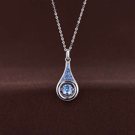 Platinum over 925 non tarnish Sterling silver with large fancy blue pendant