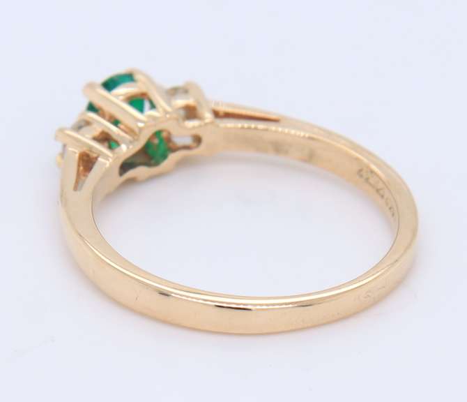 Stunning Yellow Gold Oval Emerald nad Diamond Side Ring