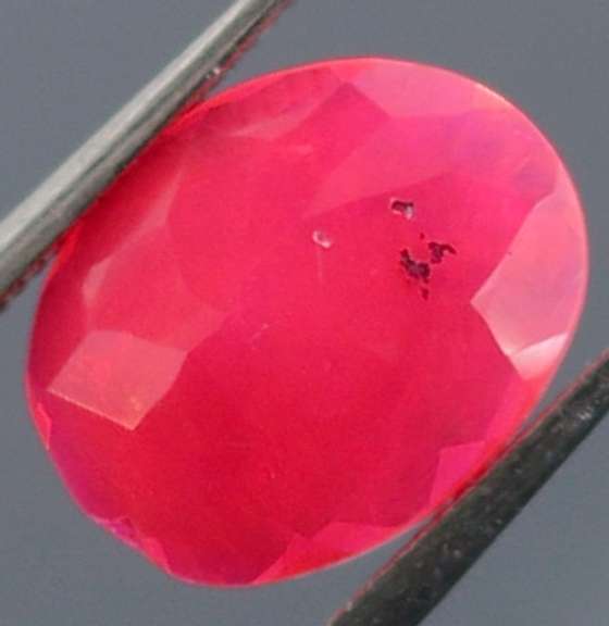 Captivating 1.26ct faceted flamingo pink Opal