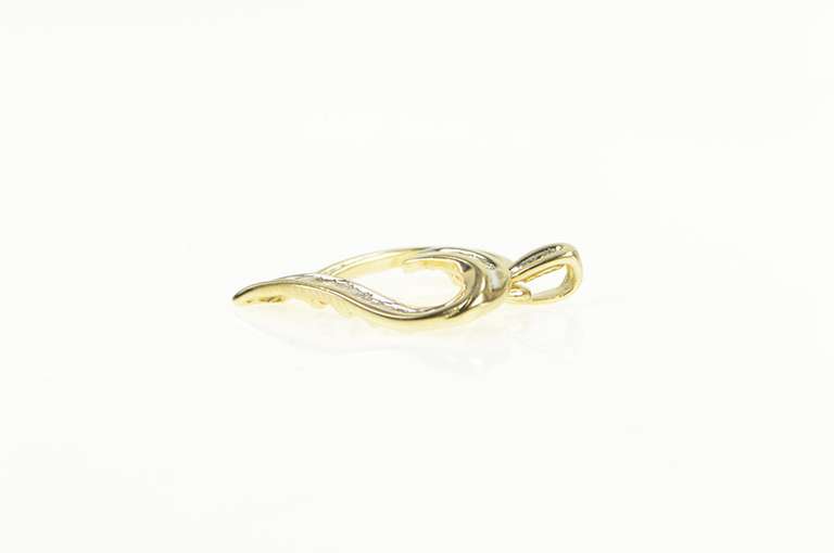 10K Yellow Gold Diamond Heart Baguette & Round Love Symbol Pendant