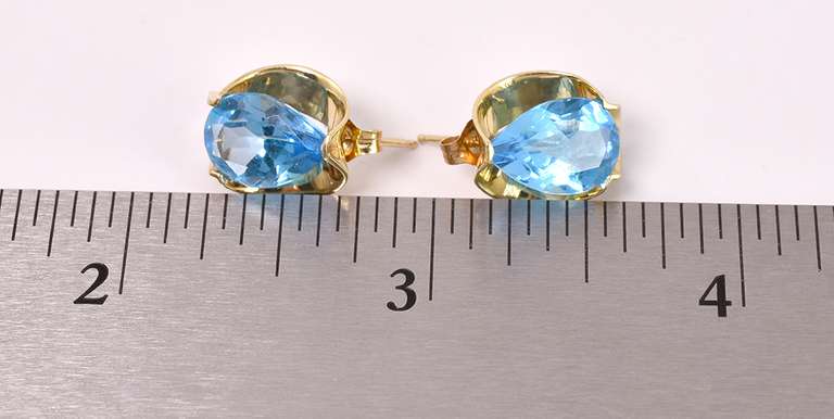 Brilliant Blue Topaz Earrings in 14K Yellow Gold