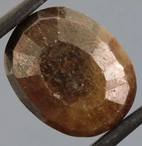 UNTREATED! Shimmering 14.08ct earth toned faceted Sapphire