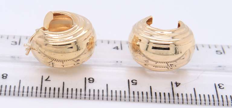 Pleasing Yellow Gold Ridded Huggies